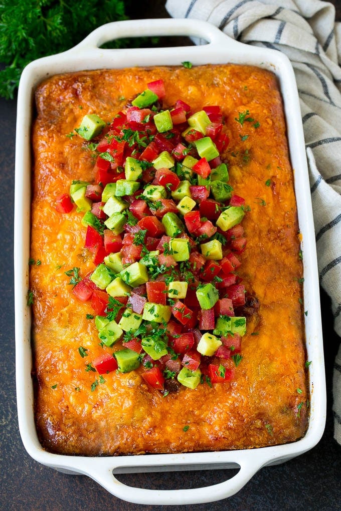 Sausage Egg Casserole Recipe | Egg Casserole #eggs #sausage #potato #cheese #casserole #breakfast #brunch #jonep Sausage egg casserole topped with avocado and tomato.