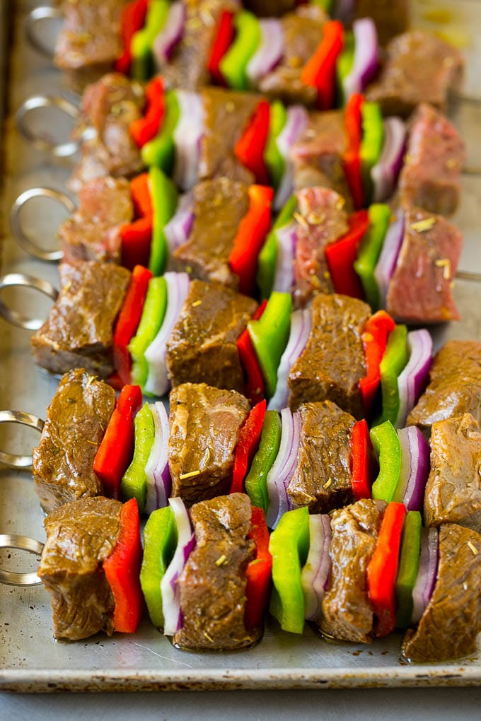 Beef Shish Kabobs Recipe | Beef Kabobs #grilling #beef #steak #dinner #jonep #peppers Raw beef skewered with peppers and onions.
