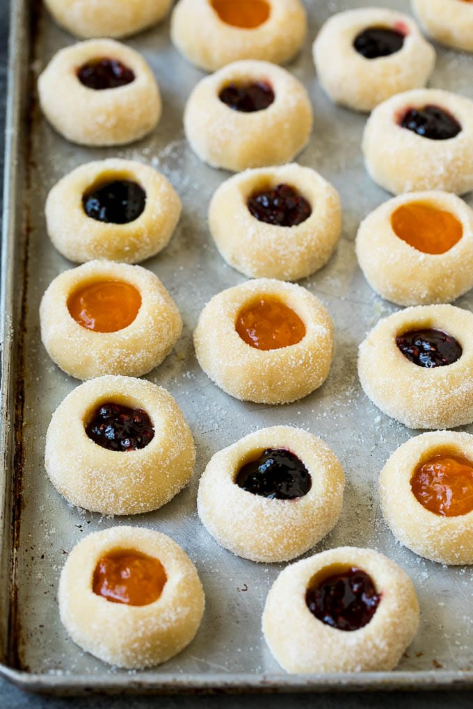 Thumbprint Cookies | Sugar Cookies #cookies #baking #christmas #dessert #jonep Cookie dough filled with fruit jam.