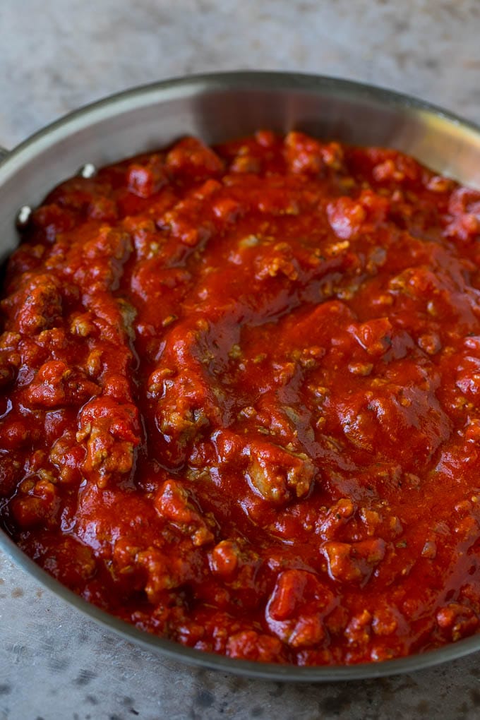 Baked Spaghetti Recipe | Baked Pasta #spaghetti #pasta #cheese #casserole #beef #sausage #dinner #jonep Meat sauce in a skillet.