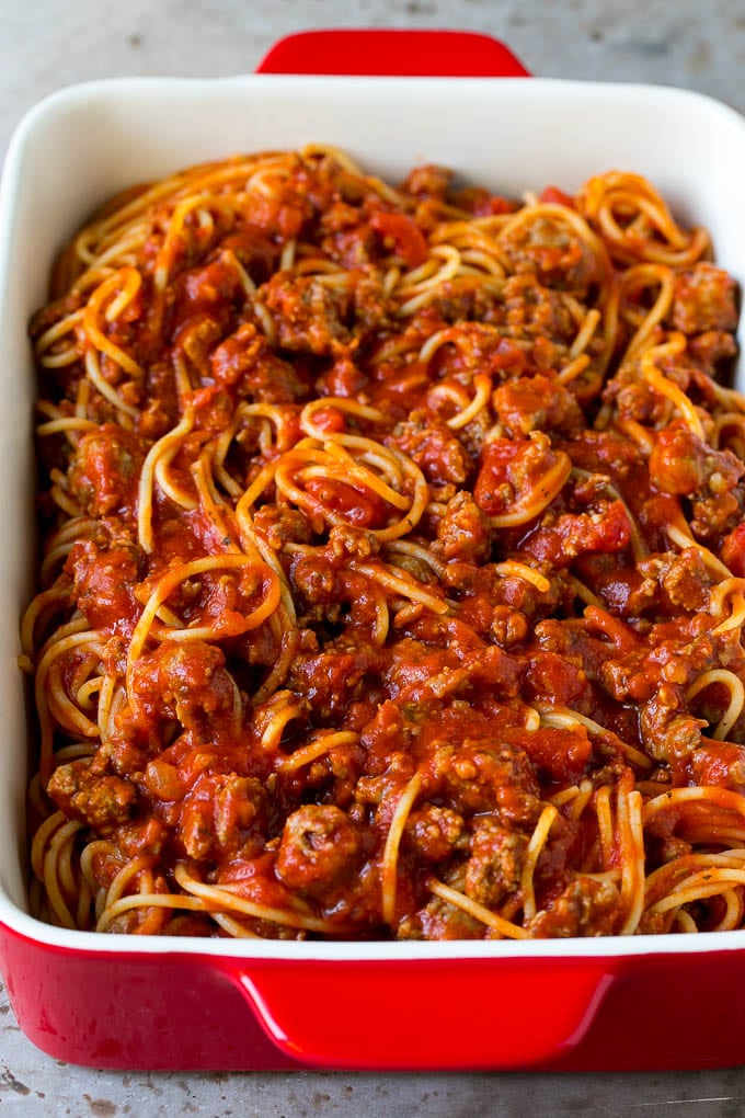 Baked Spaghetti Recipe | Baked Pasta #spaghetti #pasta #cheese #casserole #beef #sausage #dinner #jonep Pasta tossed with meat sauce in a dish.