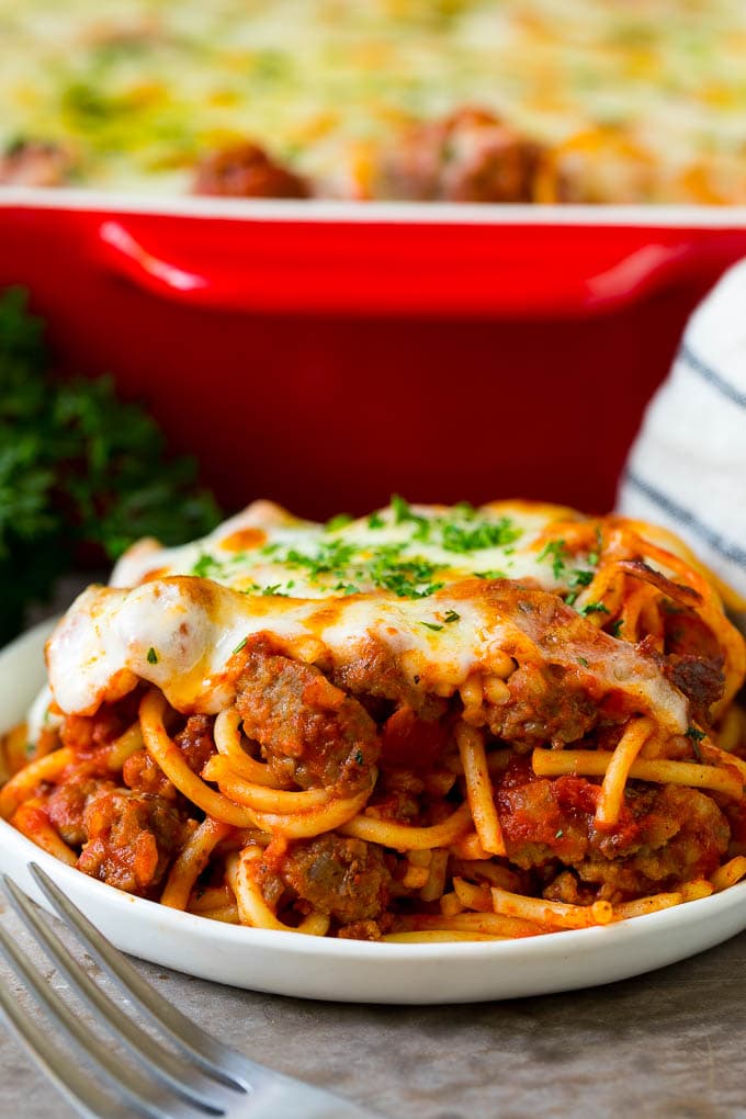 Baked Spaghetti Recipe | Baked Pasta #spaghetti #pasta #cheese #casserole #beef #sausage #dinner #jonep A serving of baked spaghetti topped with melted cheese.