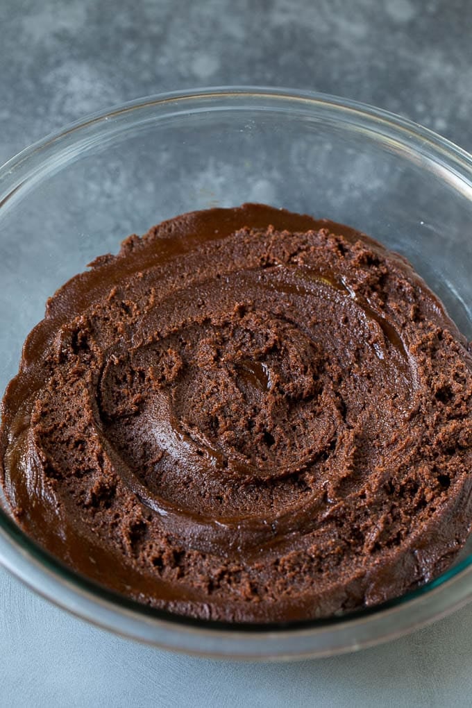 Chocolate Crinkle Cookies Recipe #cookies #chocolate #christmas #dessert #baking #jonep A bowl of chocolate cookie dough.