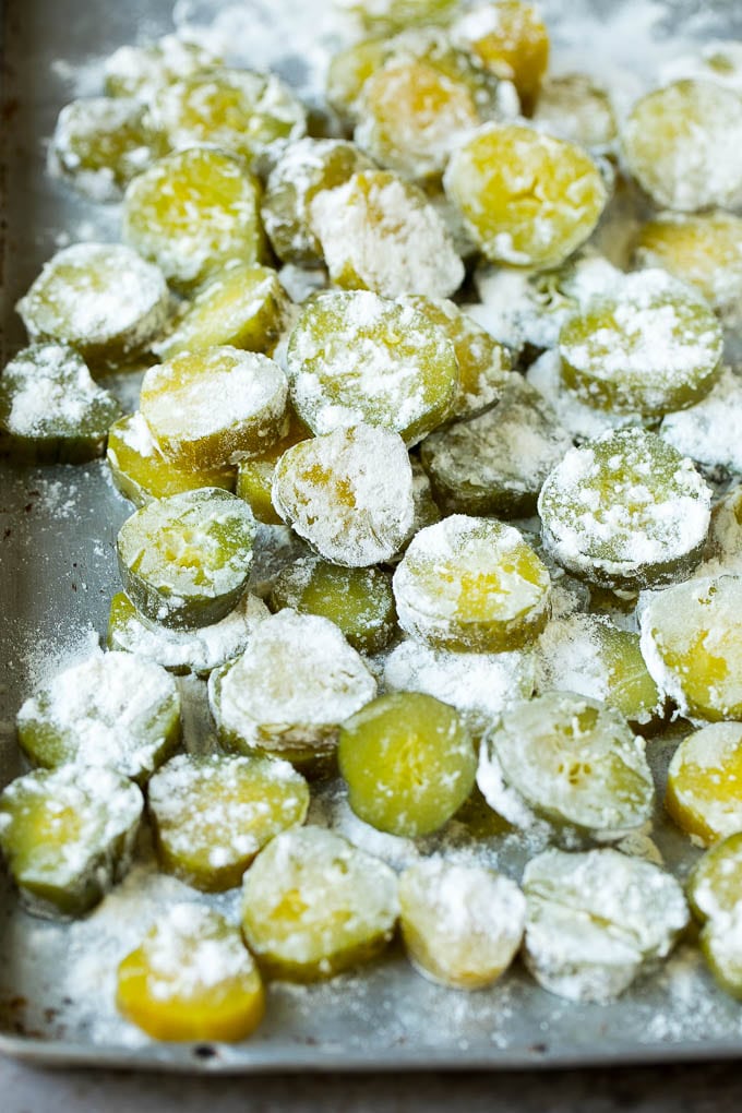 Fried Pickles Recipe #pickles #appetizer #snack #jonep Pickle slices coated in flour.