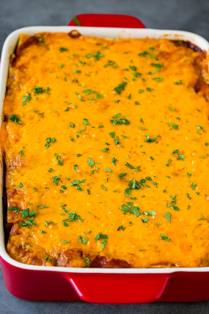 Mexican Lasagna Recipe | Mexican Casserole #mexican #lasagna #groundbeef #beans #dinner #cheese #jonep A baked Mexican casserole topped with melted cheese and cilantro.