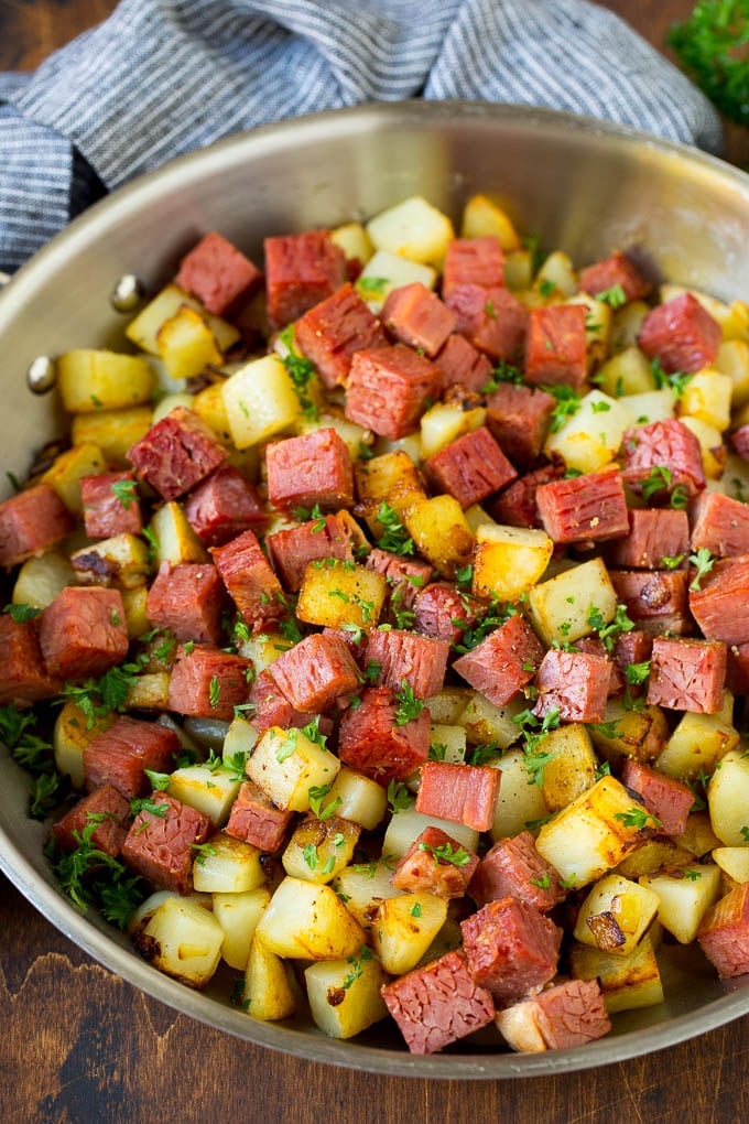 Corned Beef Hash Recipe #hash #cornedbeef #stpatricksday #breakfast #brunch #potatoes #jonep Corned beef hash with potatoes, onions and fresh herbs.