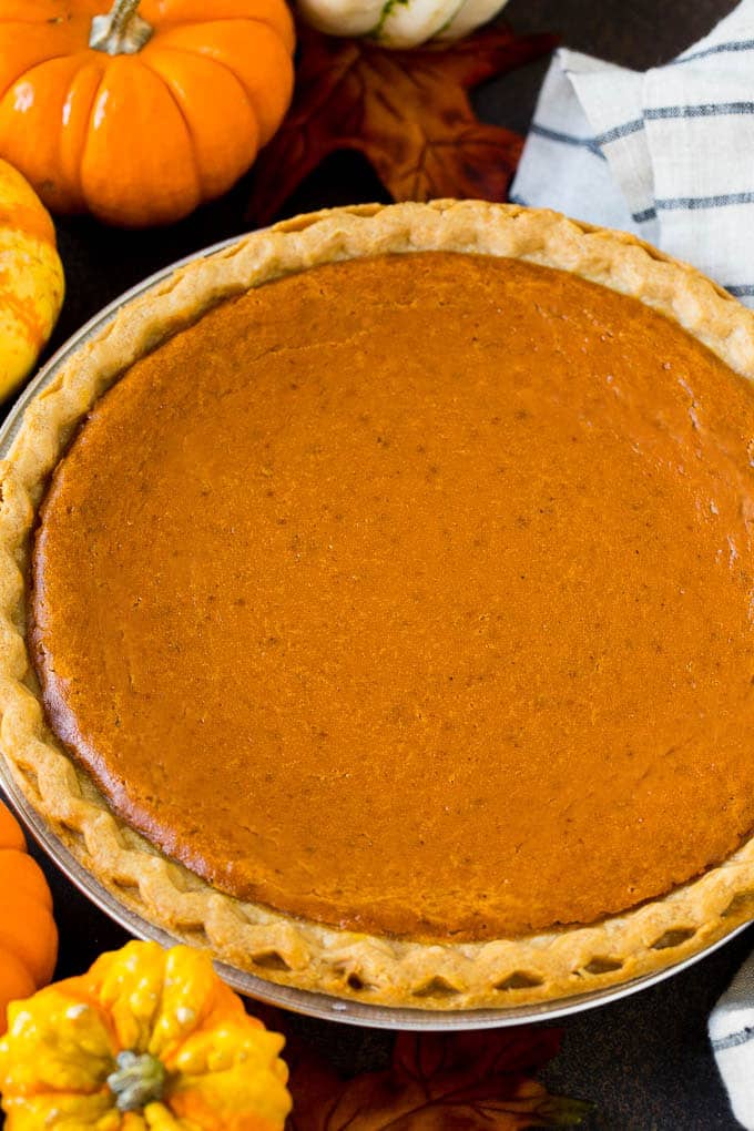 Homemade Pumpkin Pie Recipe | Pumpkin Pie #pie #pumpkin #baking #thanksgiving #fall #dessert #jonep A whole pumpkin pie in a flaky crust.