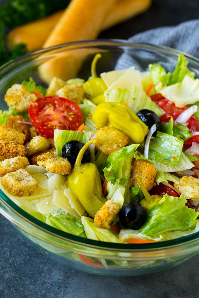 Olive Garden Salad Recipe | Italian Salad #salad #lettuce #olives #sidedish #dinner #jonep A tossed Olive Garden salad with Italian dressing, vegetables and olives.