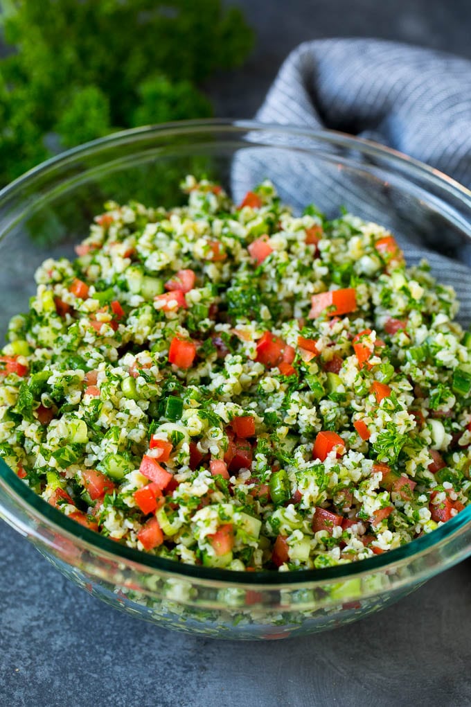 Tabbouleh Salad | Tabouli #salad #wheat #tomatoes #cucumber #healthy #sidedish #dinner #jonep A serving bowl filled with tabbouleh salad.