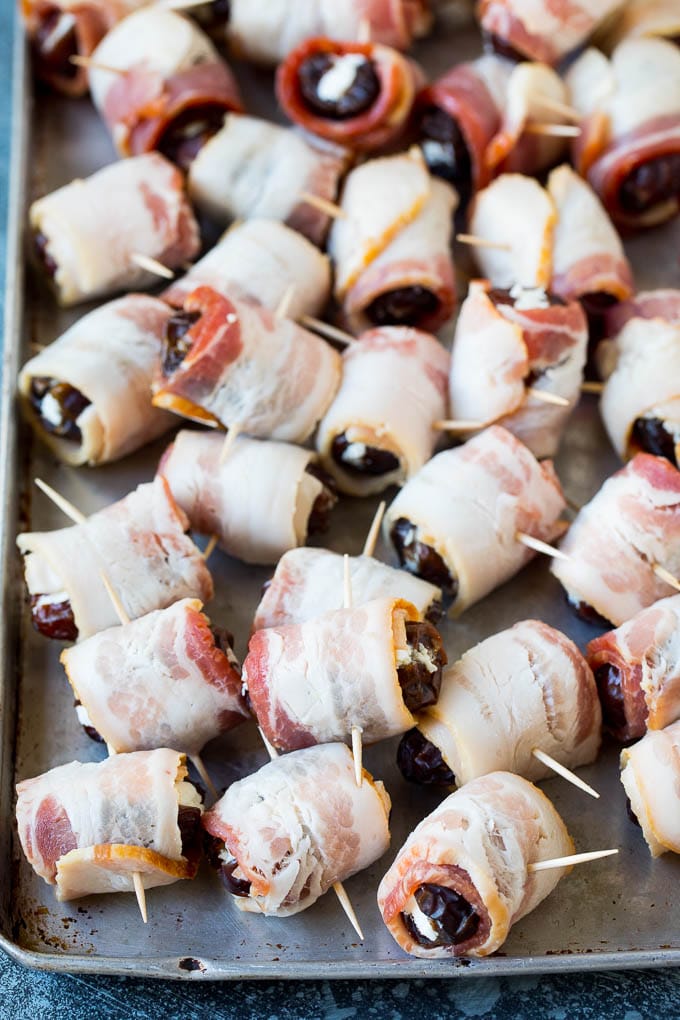 Bacon Wrapped Dates #appetizer #bacon #dates #cheese #jonep Dates wrapped in bacon and secured with toothpicks.