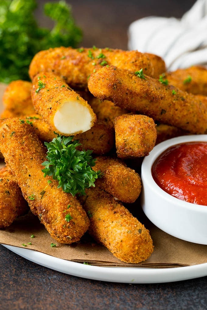 Mozzarella Sticks Recipe #cheese #appetizer #jonep Mozzarella sticks served with a side of marinara sauce.