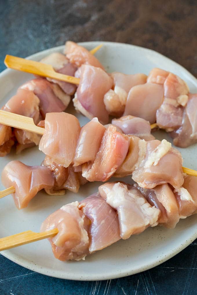 Chicken Yakitori Recipe | Grilled Chicken #chicken #grilling #dinner #jonep Raw chicken threaded onto skewers.