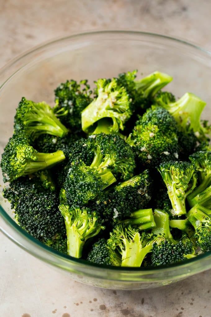 Grilled broccoli is packed with flavor and is a colorful and healthy side dish! #broccoli #jonep Florets tossed with olive oil, garlic and herbs.