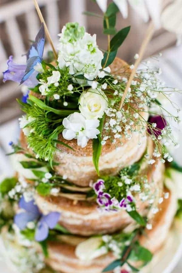 Waarom hierdie jaar eetbare blomme kweek en hoe om hulle te eet 3 Eetbare blomme as 'n garnering op 'n gereg