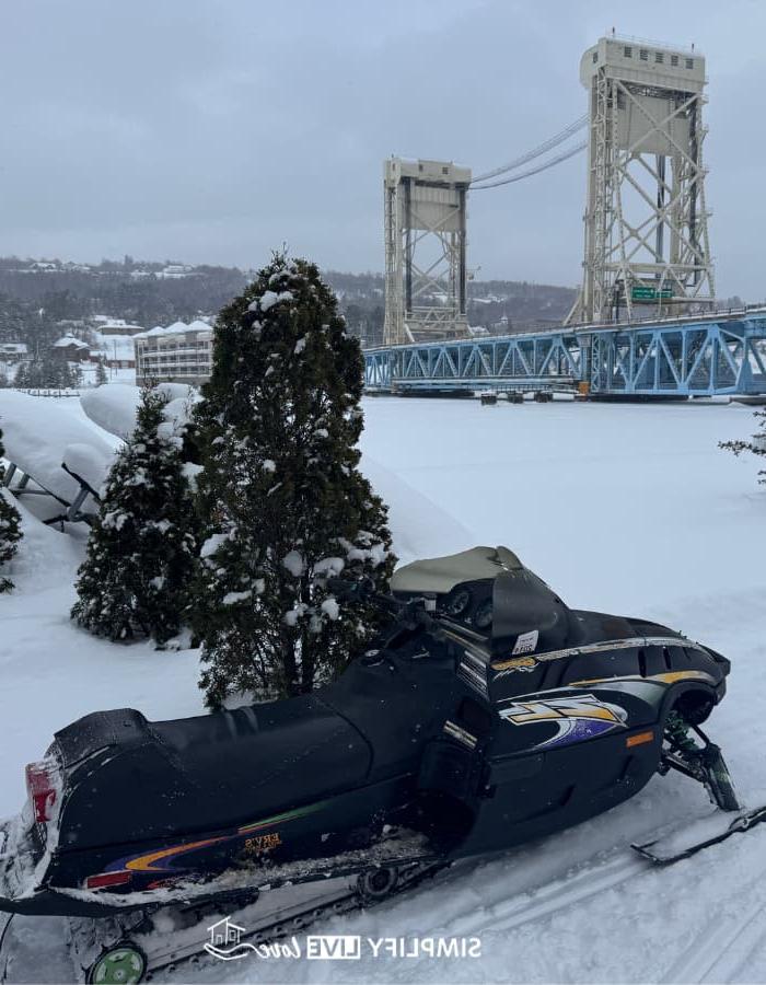 snowmobile and the portage bridge in houghton snowmobile and the portage bridge in houghton