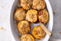 Cheesecake Stuffed Peaches with Graham Cracker Crumble