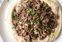 Rich Spiced Beef Hummus with Golden Pine Nuts