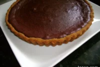 Rich Dark Chocolate Tart with Spiced Gingersnap Crust
