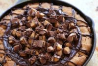 The Ultimate Reese’s Peanut Butter Chocolate Chip Cookie Cake