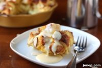 Warm Almond Bread Pudding with Spiced Eggnog Sauce