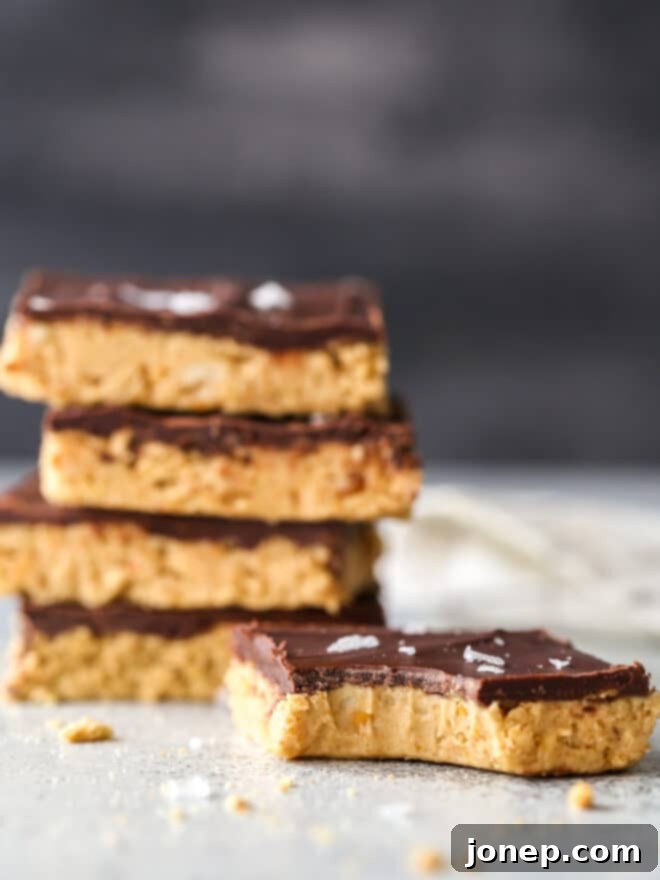 Ultimate Chocolate Peanut Butter No Bake Bars 2 Delicious no-bake chocolate peanut butter bars ready to be served.