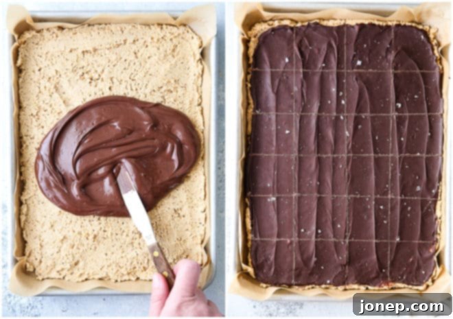 Ultimate Chocolate Peanut Butter No Bake Bars 5 No-bake chocolate peanut butter bars freshly sliced and arranged on a cutting board.