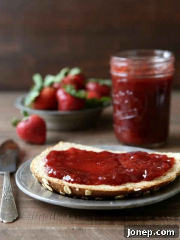 Various spreads including homemade strawberry jam on toast, for serving suggestions.