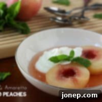 Riesling-Amaretto Infused Peaches 2 Riesling and Amaretto Poached Peaches recipe image