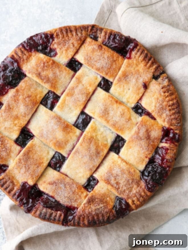 Golden brown, perfectly flaky all-butter pie crust, ready for filling.