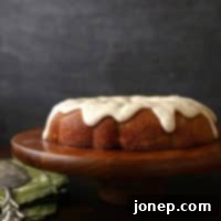 Spiced Zucchini Pear Cake with Brown Butter Glaze | completelydelicious.com