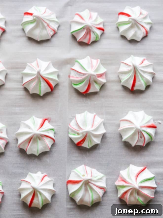 peppermint meringues on a sheet pan