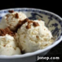 Holiday Nog Delight 2 A scoop of homemade eggnog ice cream with gingersnap crumbles