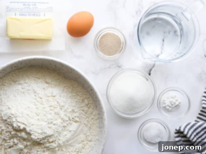 Effortless Cloud Crescents 4 ingredients for fairy crescent rolls laid out on a counter