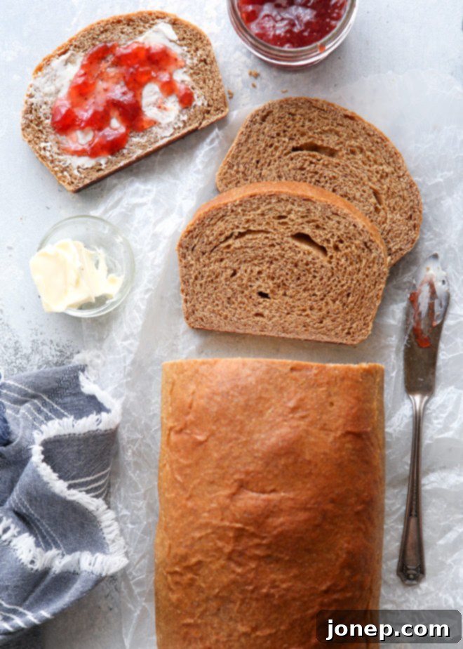 Wholesome Whole Wheat Loaf 6 A selection of freshly baked 100% whole wheat bread loaves, showcasing their wholesome appeal.