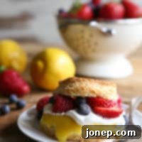 Zesty Berry Shortcake Delights 7 Lemon biscuit shortcakes stuffed with lemon curd, whipped cream, and fresh berries.