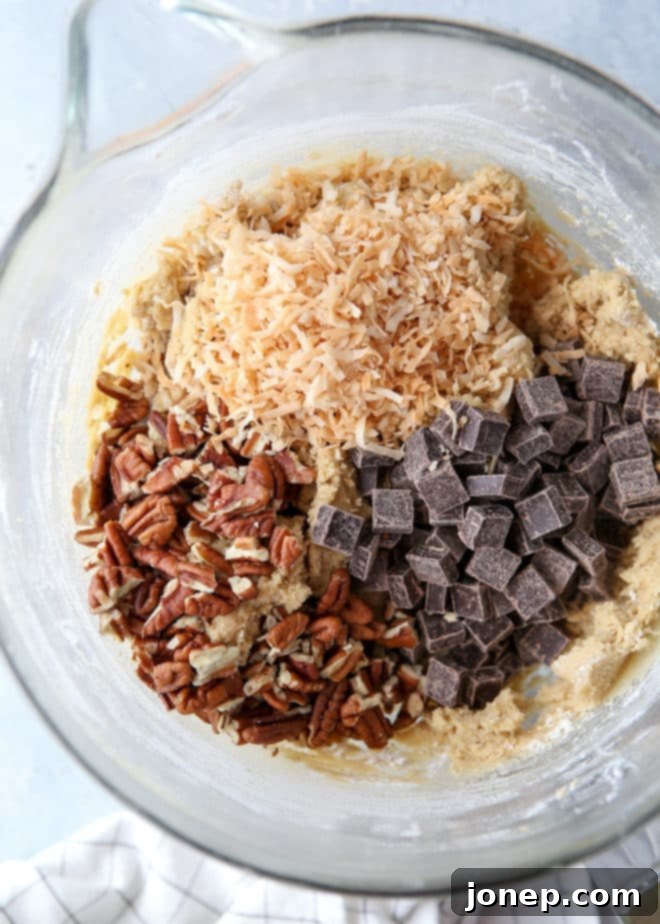 These cookies packed with toasted coconut, pecan, and dark chocolate have crisp edges, chewy centers and irresistible flavor.