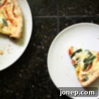 Savory Roasted Pepper Quiche with Feta and Spinach 2 A top-down view of the Roasted Pepper Quiche with Spinach and Feta