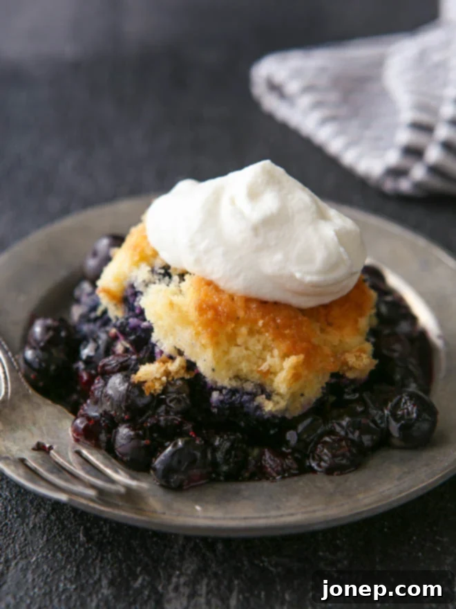 Effortless Dutch Oven Cobbler 2 Easy 4-ingredient Dutch oven fruit cobbler baking over coals for camping