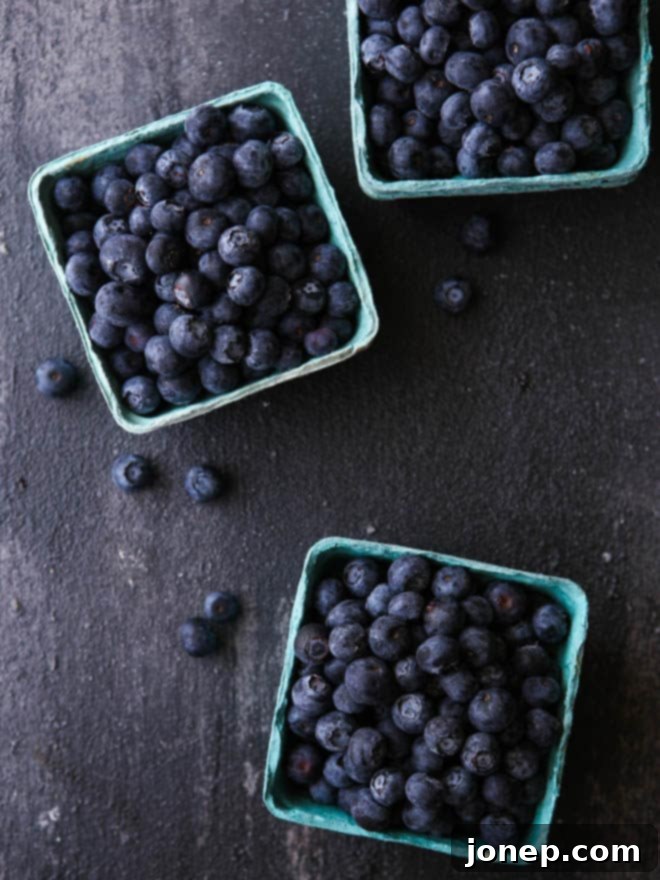 Effortless Dutch Oven Cobbler 3 Easy 4-ingredient Dutch oven cobbler with a golden crust and fresh berries