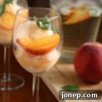 Wine-Kissed Peach Sorbet 2 A bowl of Peach Sangria Sorbet