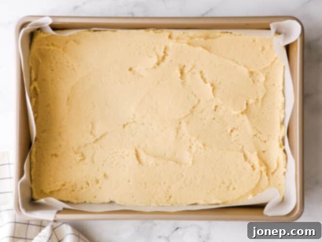 cookie base spread into baking pan