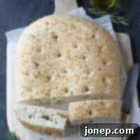 Rosemary Parmesan Focaccia 2 Rosemary and Parmesan Focaccia in a square pan