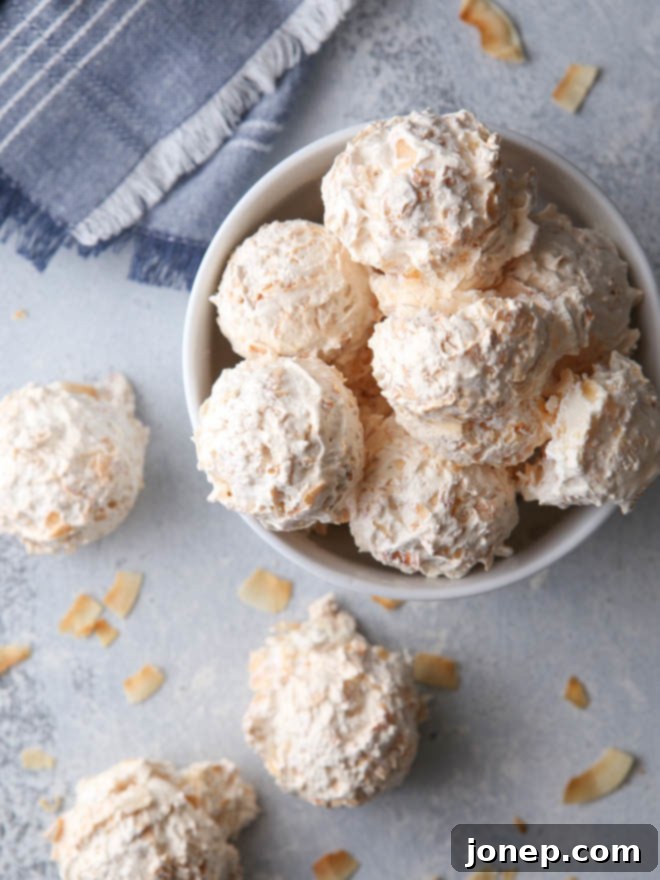 Light and Chewy Coconut Meringue Macaroons on a baking sheet