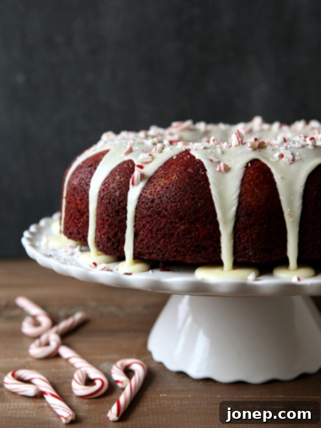 Peppermint Red Velvet Bundt Cake with Cream Cheese Filling and White Chocolate Ganache | completelydelicious.com