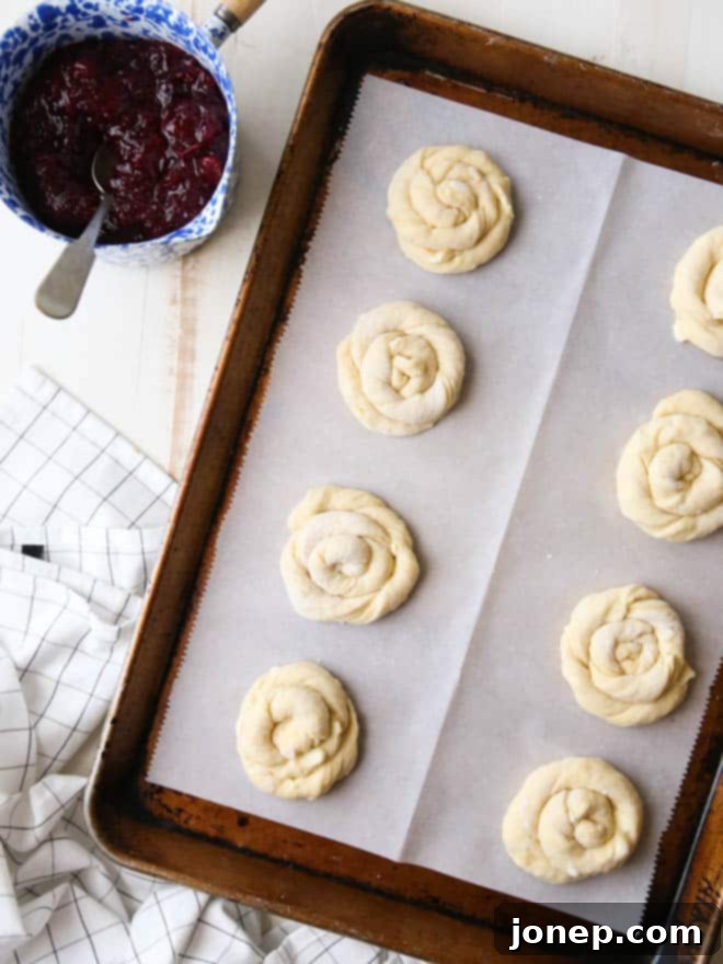Spiced Cranberry Orange Danishes drizzled with orange glaze