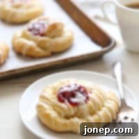 Spiced Cranberry Orange Danishes | completelydelicious.com