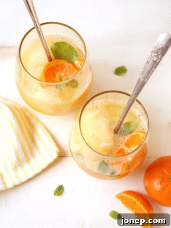 Tangerine Sorbet Champagne Floats | completelydelicious.com