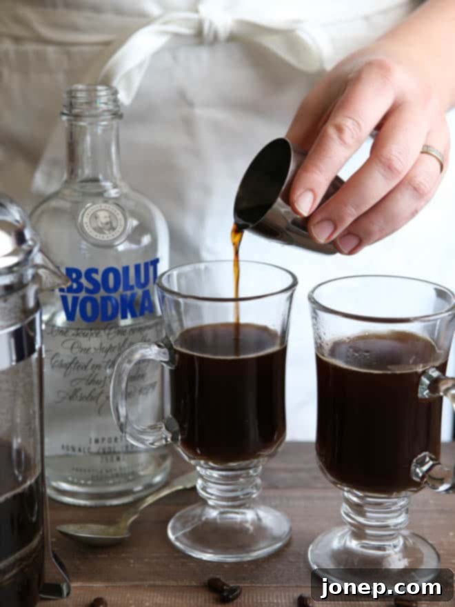 Adding vodka to coffee and chocolate syrup