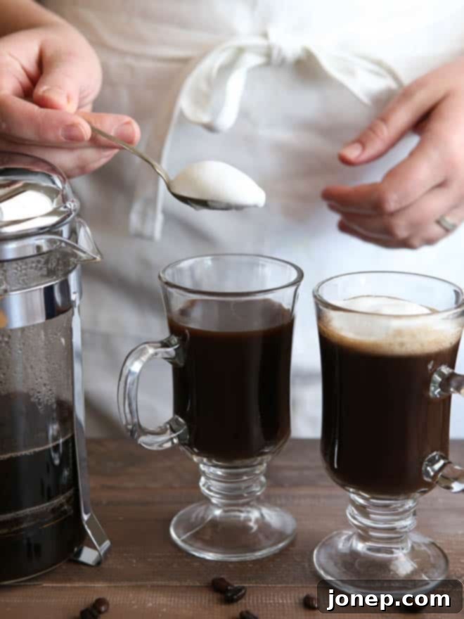 Pouring frothed milk into the White Russian Mocha