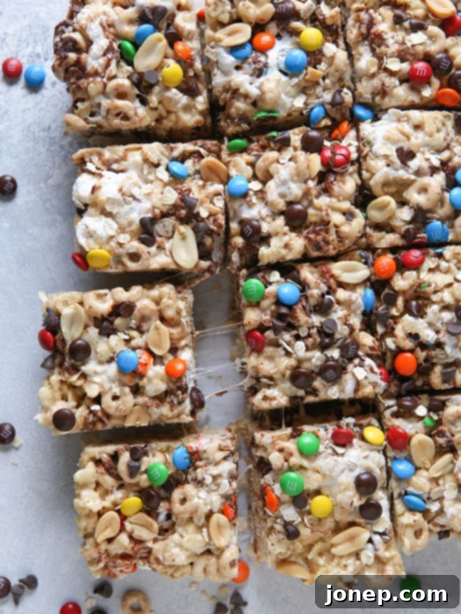 Monster Marshmallow Cereal Treats pressed into a pan, ready to set